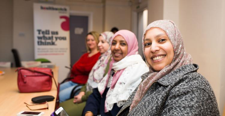 A group of women smiling