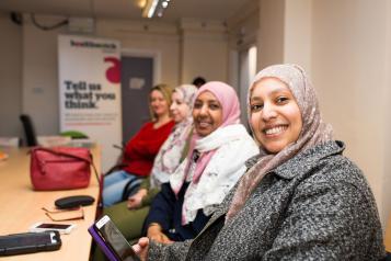 A group of women smiling