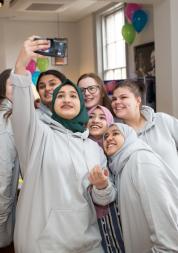 Group of young volunteers having a selfie